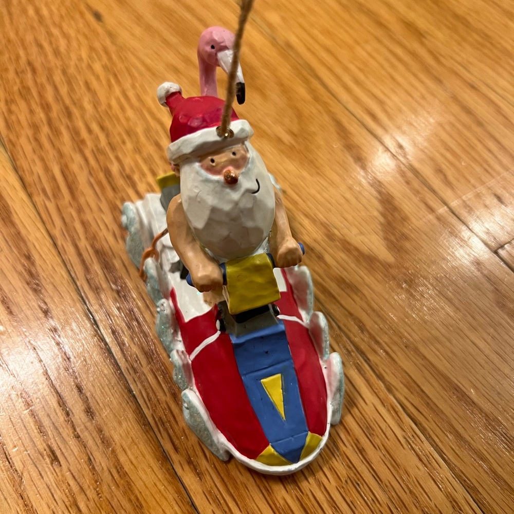 Santa and Flamingo on jet ski ornament